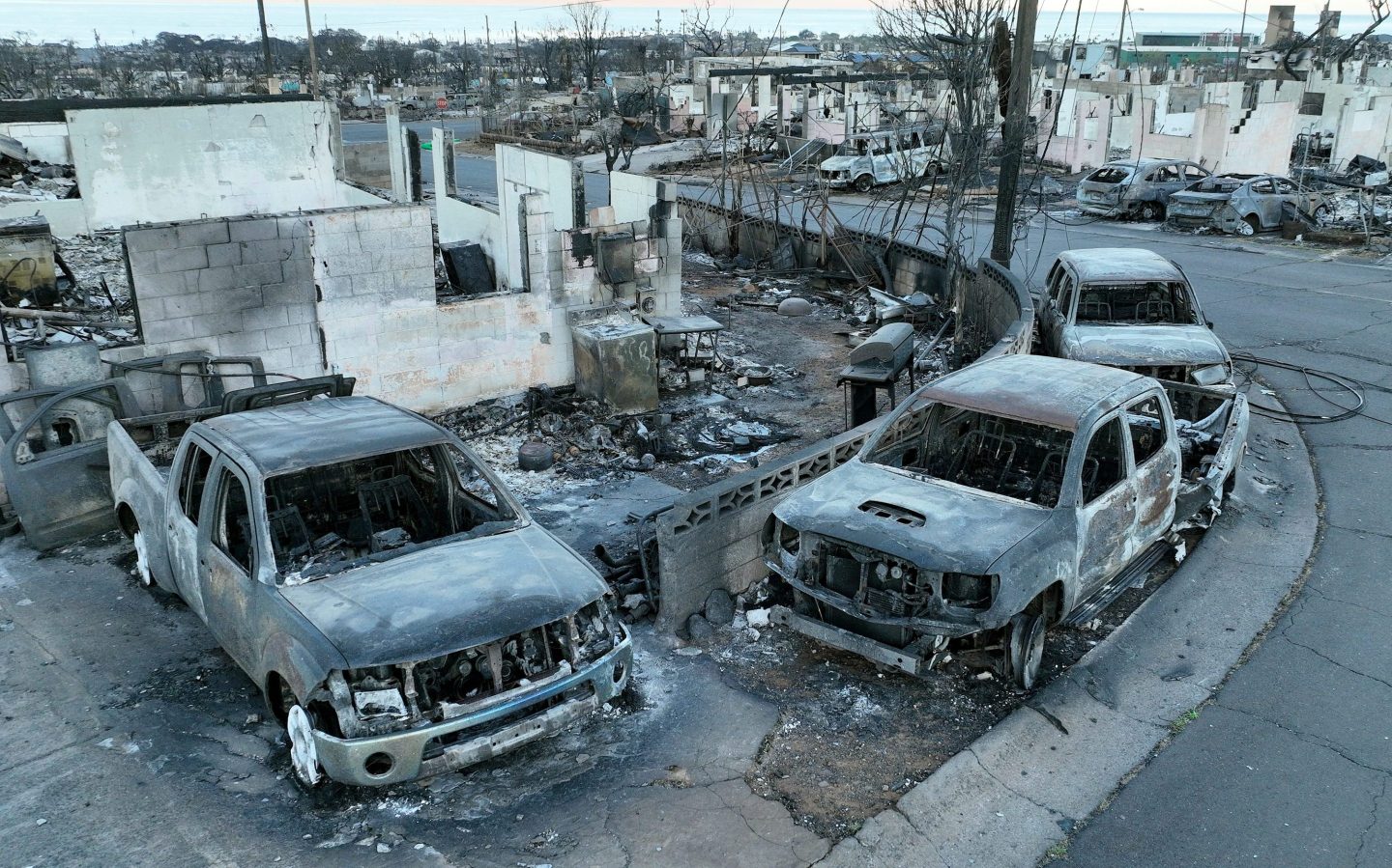 LAHAINA, HAWAII &#8211; AUGUST 18: In an aerial view, burned cars and homes are seen in a neighborhood that was destroyed by a wildfire on August 18, 2023 in Lahaina, Hawaii. At least 111 people were killed and thousands were displaced after a wind driven wildfire devastated the towns of Lahaina and Kula early last week. Crews are continuing to search for missing people. (Photo by Justin Sullivan/Getty Images)