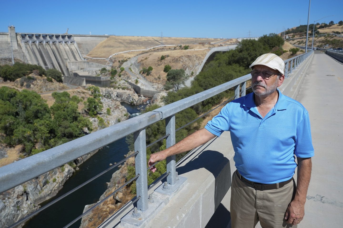 man standing on dam