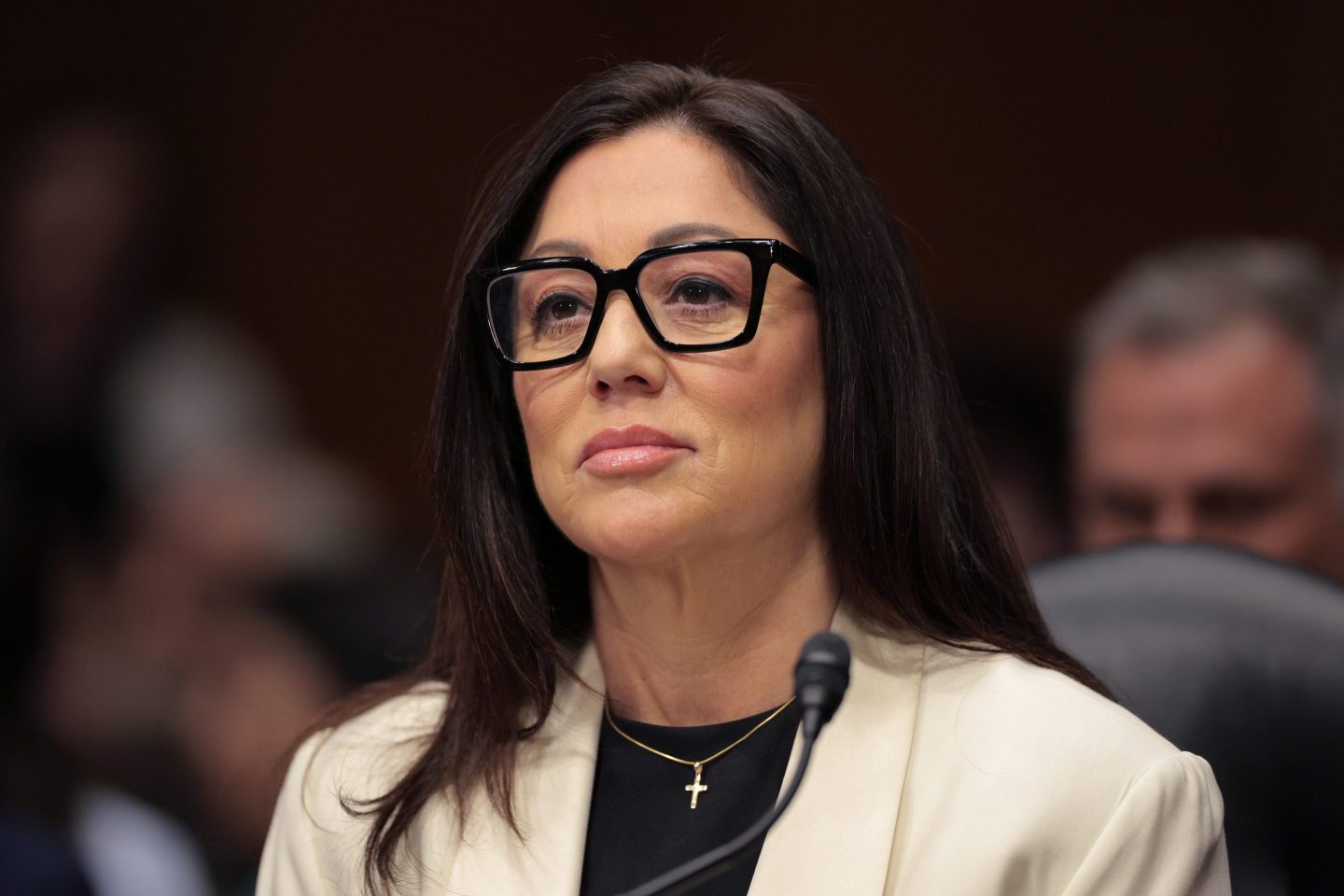 Lori Chavez-DeRemer sits in front of a Senate committee, ready to answer questions