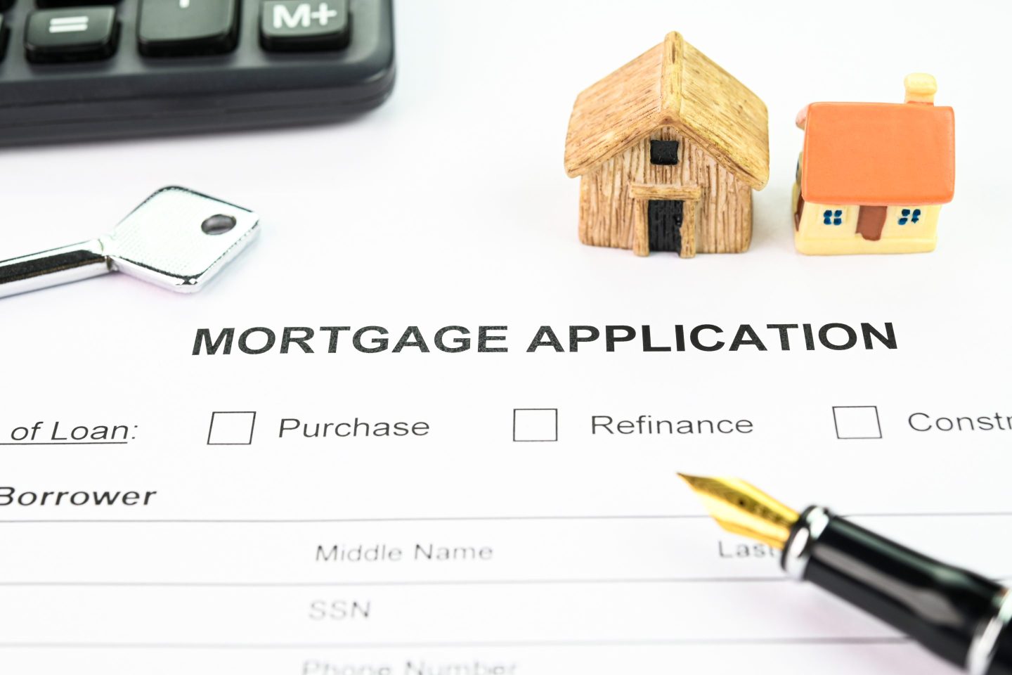 Filling up a mortgage application form.