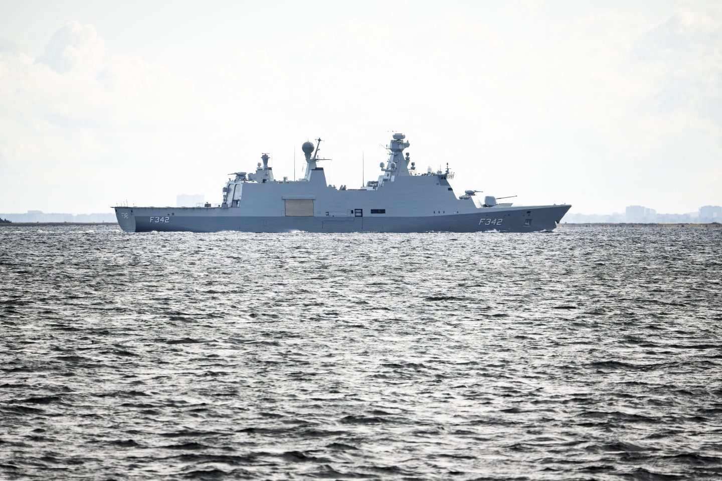 COPENHAGEN, DENMARK &#8211; SEPTEMBER 30: Danish frigate HDMS Esbern Snare (F342)  patrols the water and the airspace at Copenhagen Airport on September 30, 2025 in Copenhagen, Denmark. As Copenhagen hosts the European Political Community summit this week, Denmark has beefed up security measures and imposed a nationwide ban on civilian drone flights, following recent incidents in which drone activity disrupted flights at multiple airports. Its government said the flights were the work of a &#8216;professional actor&#8217; but there was no evidence of Russian involvement. (Photo by Martin Sylvest Andersen/Getty Images)