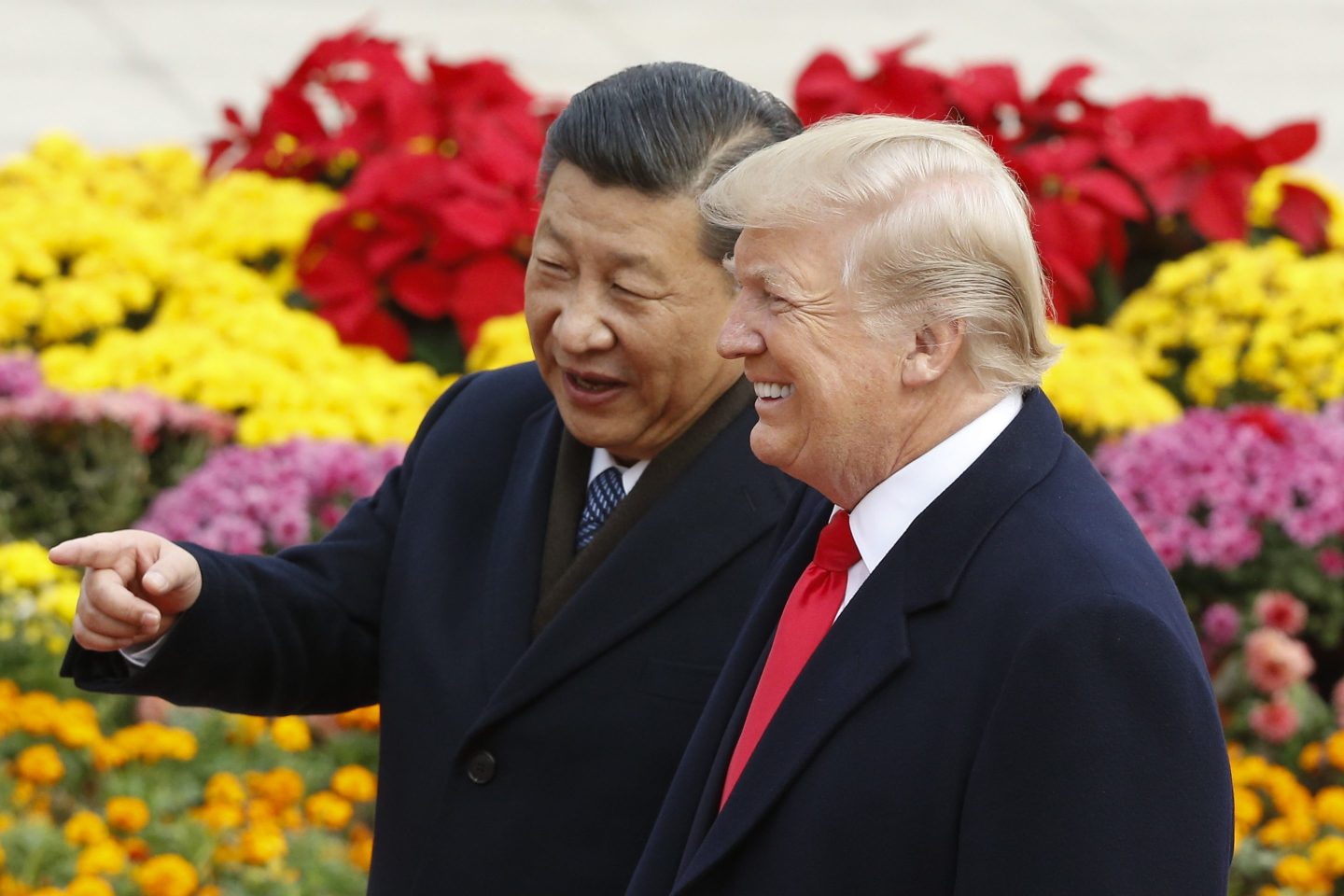 BEIJING, CHINA &#8211; NOVEMBER 9:  Chinese President Xi Jinping and U.S. President Donald Trump attend a welcoming ceremony November 9, 2017 in Beijing, China. Trump is on a 10-day trip to Asia.  (Photo by Thomas Peter-Pool/Getty Images)